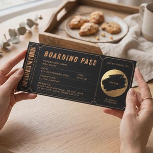 May include: A black boarding pass with gold text and a circular scratch-off area. The text reads: BOARDING PASS, PASSENGER NAME: ROB SNOW, DATE: 4TH SEPTEMBER 2026, TIME: 08:00 AM, DEPARTURE: LUTON AIRPORT, MESSAGE: HAPPY 21ST BIRTHDAY TO THE LOVE OF MY LIFE!