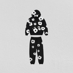 May include: Black hoodie and sweatpants set with a white floral pattern. The hoodie has a drawstring hood and a front pocket. The sweatpants have an elastic waistband and cuffs. The floral design is repeated across both pieces.