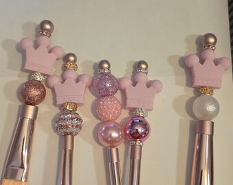 Princess Inspired Beaded Make-up Brushes in shades of Rose Gold, Blue, and Purple.  Hand Beaded