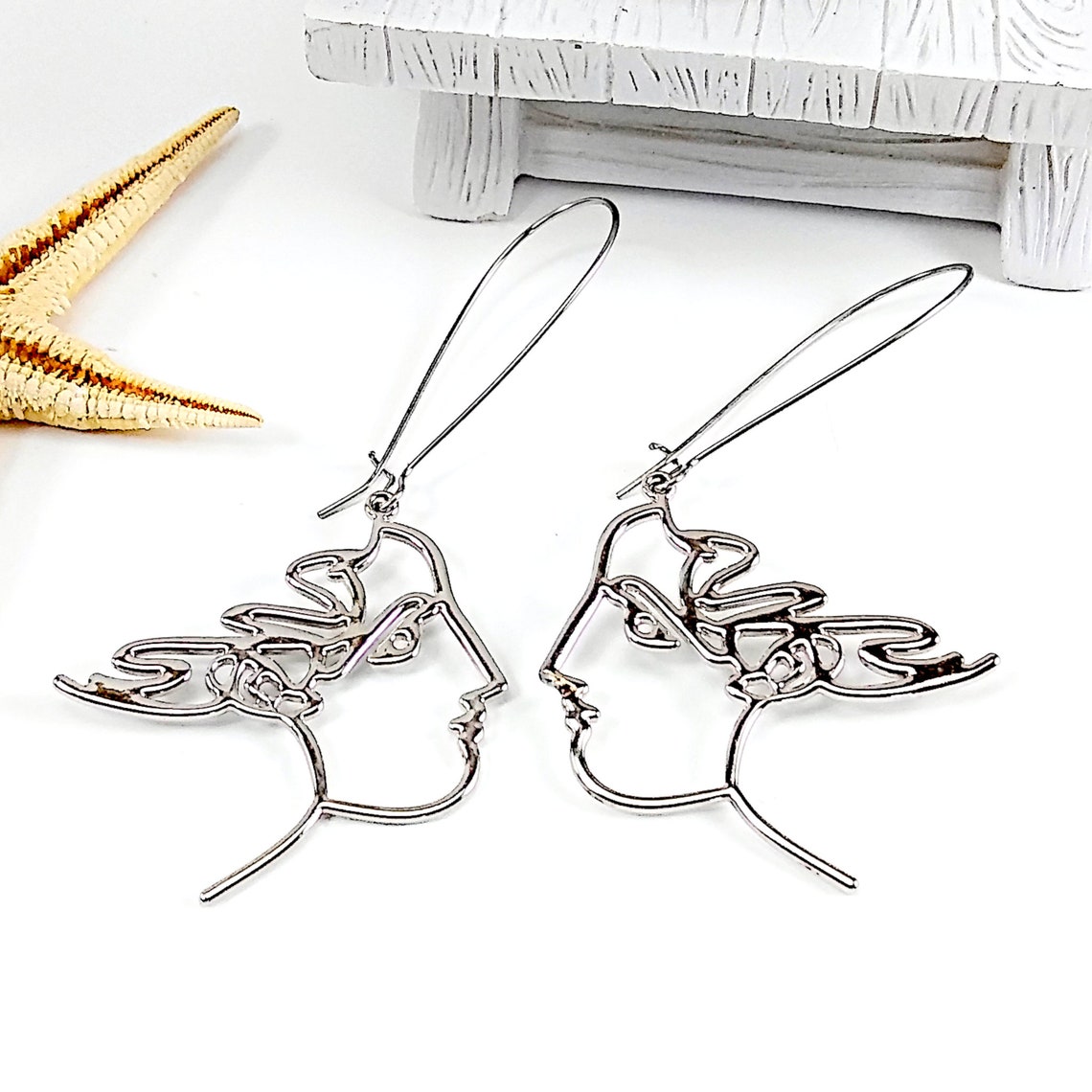 Face outline earrings Clearance