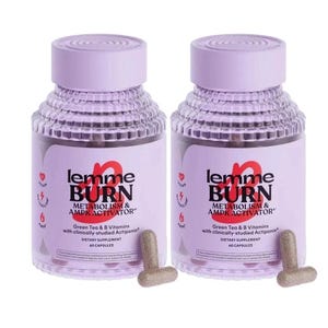May include: Two bottles of "lemme BURN" dietary supplement capsules. The bottles are light purple with a clear body, and feature the text "METABOLISM & AMPK ACTIVATOR". Two capsules are visible in front of the bottles. The capsules are light brown.