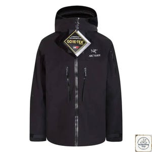 May include: Black hooded jacket with a zip closure, two front pockets, and the "GORE-TEX" and "Arc'teryx" logos. The jacket has a high collar and a tag attached to the zip.