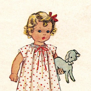 May include: A young girl with blonde hair and a red bow in her hair is wearing a white dress with red polka dots. She is holding a light blue toy lamb.