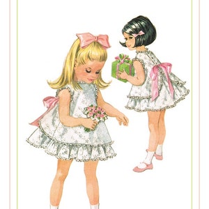 May include: Two girls wearing white dresses with pink bows and ruffles. One girl is holding a bouquet of pink flowers, and the other is holding a wrapped gift.
