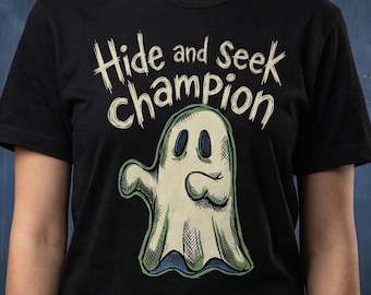 Camiseta de fantasmas campeona del escondite / Camiseta divertida y espeluznante de Halloween, camiseta gráfica graciosa para introvertidos, regalo unisex de algodón para amantes de los fantasmas