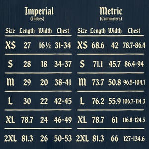 May include: A navy blue chart with white text detailing garment measurements in inches and centimeters. The chart includes sizes XS to 2XL, with measurements for length, width, and chest. The imperial measurements are in inches.