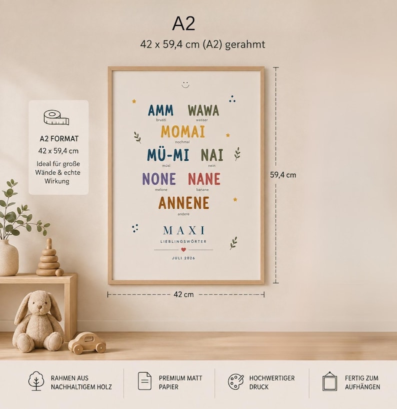 May include: A framed A2 poster measuring 42 x 59.4 cm featuring a list of child-like words in various colors including AMM, WAWA, MOMAI, M&Uuml;-MI, NAI, NONE, NANE, and ANNENE, with the text MAXI LIEBLINGSW&Ouml;RTER and JULI 2026 printed below.