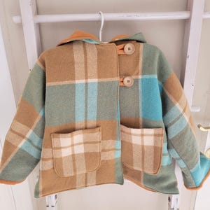 Boys Turquoise plaid wool coat with hood and pockets size 8 tan lining