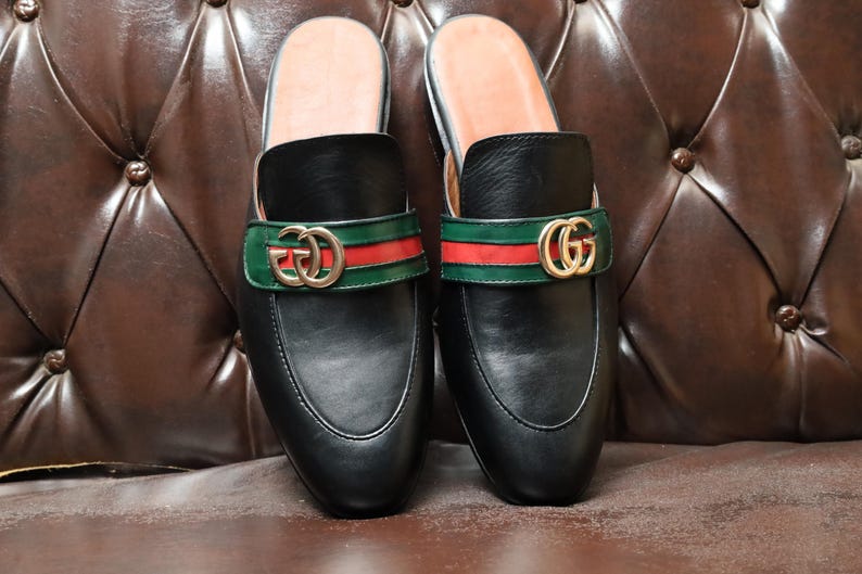 Handcrafted men’s slip-on dress shoes in smooth-grain black leather.