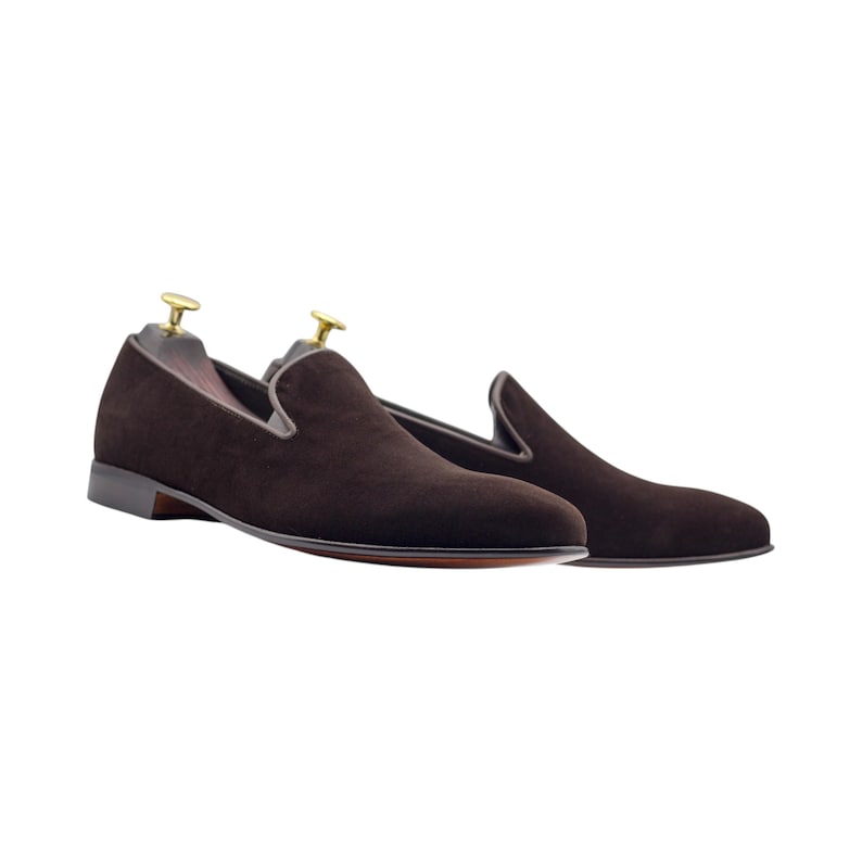 Side view of premium brown evening slippers with a plush velvet finish.