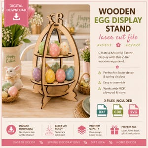 May include: A two-tier wooden egg display stand laser cut file featuring an egg-shaped frame with circular cutouts for holding eggs. The text reads WOODEN EGG DISPLAY STAND laser cut file, 3 FILES INCLUDED, DXF, CDR, SVG, and DIGITAL DOWNLOAD.