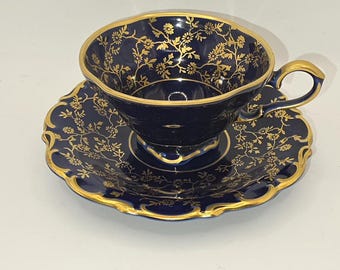 Taza y platillo Lindner Keups vintage de color azul cobalto con detalles en oro de 22 quilates.