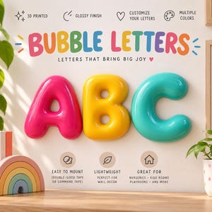 May include: Three 3D printed bubble letters A, B, and C with a glossy finish. The letter A is pink, B is yellow, and C is teal. Text on the wall reads BUBBLE LETTERS, LETTERS THAT BRING BIG JOY, EASY TO MOUNT, LIGHTWEIGHT, and GREAT FOR.