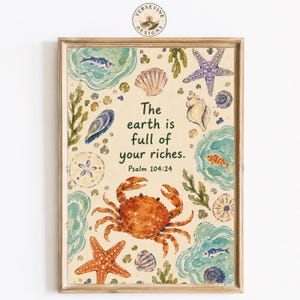 May include: A framed wall art print featuring a watercolor illustration of marine life including a crab, starfish, seashells, and fish on a cream background. The text reads: The earth is full of your riches. Psalm 104:24. The frame is light wood.