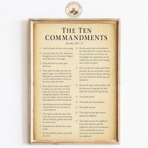 May include: A rectangular wall print on aged parchment-style paper featuring the text of The Ten Commandments from Exodus 20:1-17 in black serif font. The design includes a circular logo at the top with the text Versevine Designs.