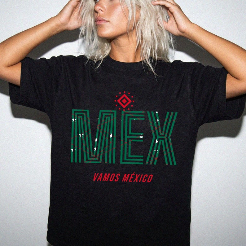 May include: Black t-shirt with the word "MEX" in green, outlined with white, and a red geometric design above it. The phrase "VAMOS M&Eacute;XICO" is printed in red below the word "MEX".