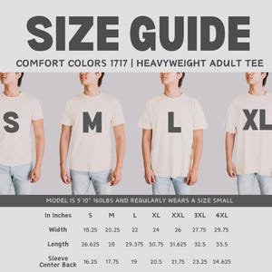 May include: Size guide for Comfort Colors 1717 heavyweight adult tee shirts. The image shows four models wearing different sizes: S, M, L, and XL. Measurements in inches are provided for width, length, and sleeve center back for sizes S through 4XL.