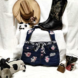 Life on the funny side. Repurposed denim purse with cows. Yes cows!
