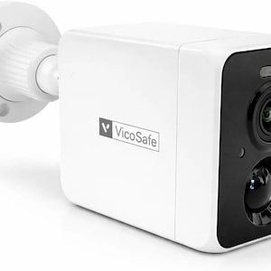 May include: A white VicoSafe security camera with a black front panel. The camera has a lens and a sensor, and is mounted on a white bracket. The VicoSafe logo is visible on the side.