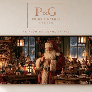 May include: A digital artwork display featuring Santa Claus in a workshop filled with toys, including rocking horses, teddy bears, and a train. The text P&G PRINT & GATHER STUDIO 4K PREMIUM FRAME TV ART is displayed above the rectangular framed image.