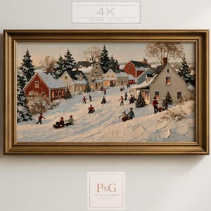 Puede incluir: Un cuadro de paisaje enmarcado que representa una escena de pueblo nevado con casas rojas y blancas, árboles de hoja perenne y personas jugando en la nieve. La obra presenta un estilo de pintura al óleo texturizada con luz cálida.