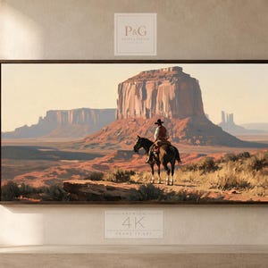 May include: A rectangular wall art print featuring a desert landscape with a large red rock butte and a person on horseback in the foreground. The image includes the text P&G PRINT & CANVAS at the top and PREMIUM 4K FRAME IT OUT at the bottom.