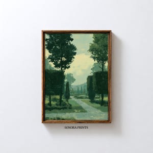 May include: A framed landscape painting depicts a garden path lined with trees and hedges. The artwork features a palette of greens and blues, with a golden-brown frame. The text "SONORA PRINTS" is visible at the bottom.