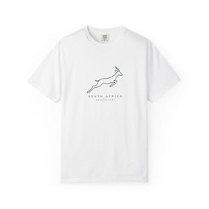 A white t-shirt with a black outline of a jumping springbok and the words "SOUTH AFRICA AMABOKOBOKO" below it, laid flat on a white background.