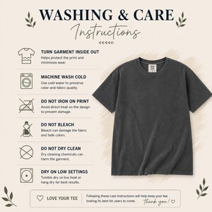 May include: A charcoal gray short-sleeved t-shirt displayed next to a list of washing and care instructions. The text includes: WASHING & CARE Instructions, TURN GARMENT INSIDE OUT, MACHINE WASH COLD, DO NOT IRON ON PRINT, DO NOT BLEACH, DO NOT DRY CLEAN, DRY ON LOW SETTINGS, LOVE YOUR TEE.