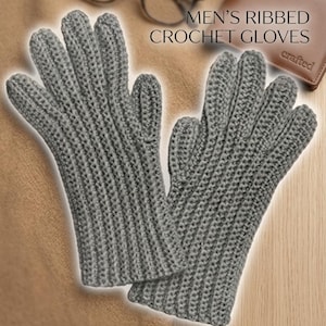 May include: A pair of grey ribbed crochet gloves with a textured knit pattern. The text "MEN'S RIBBED CROCHET GLOVES" is visible in the upper right corner, along with a brown wallet and glasses partially visible in the background.