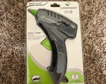 Pistola de pegamento caliente completamente nueva