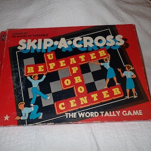 May include: A red box game board with the title "SKIP-A-CROSS" in yellow letters. The game is licensed by the makers of Scrabble. The box shows a game board with the words "REPEATER", "OR", and "CENTER" spelled out in yellow letters on red tiles.