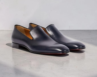 cristian loubution schwarz leder mit roter sohle loffer