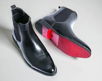 Christian Louboutin Schnürschuhe aus schwarzem Leder mit roter Sohle | Handgefertigte Luxus Stiefel