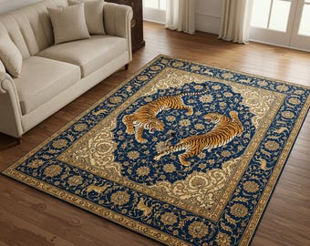 May include: A rectangular area rug featuring a deep blue central field with two orange and black tigers in a dynamic pose. The rug is framed by a wide, ornate border in shades of gold and beige, decorated with intricate floral and animal motifs.