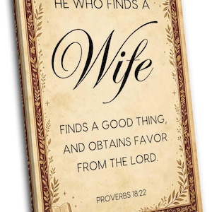 May include: A rectangular canvas wall art piece with a vintage parchment-style background. It features a dark red decorative border with gold leaf motifs and the text: HE WHO FINDS A WIFE FINDS A GOOD THING, AND OBTAINS FAVOR FROM THE LORD. PROVERBS 18:22.