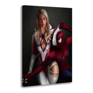 May include: A canvas print featuring a blonde woman in a white and red superhero suit with a hood and white headphones, standing beside a red and blue costumed superhero with a spider emblem on the chest against a dark, textured background.