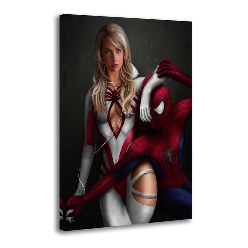 May include: A canvas print featuring a blonde woman in a white and red superhero suit with a hood and white headphones, standing beside a red and blue costumed superhero with a spider emblem on the chest against a dark, textured background.