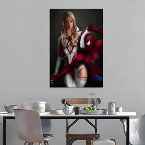 May include: A vertical wall art print featuring a blonde character in a white and red bodysuit with a hood, standing beside a red and blue costumed character with a spider emblem on the chest. Both figures are depicted in a realistic style.
