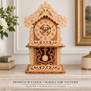 May include: A light brown wooden pendulum clock featuring an intricate scroll saw pattern. The clock face displays black Roman numerals and hands. The lower section contains a circular pendulum suspended within a decorative cutout frame. Text reads: PENDULUM CLOCK • SCROLL SAW PATTERN Digital PDF • Finished clock not included.