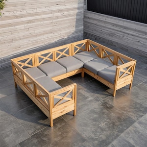 May include: A wooden outdoor sectional sofa with gray cushions. The sofa has a light brown finish and an X-shaped design on the sides. The cushions are a solid gray color. The sofa is arranged in a U-shape.