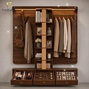 May include: A wall-mounted wooden entryway organizer featuring a coat rack with a brown handbag and scarf, a central vertical shelving unit with books and decor, a clothing rod with hanging garments, and three bottom drawers for accessories.