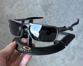 Lunettes de soleil polarisées Oakley Badman, monture noire, verres noirs, métal rare X