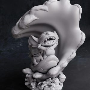 May include: A gray figurine of the characters Stitch and Lilo from the Disney movie Lilo & Stitch. The characters are inside a large, stylized shell. The base of the figurine has a rocky texture. The words "CHIBI TURNTABLE" are at the bottom.