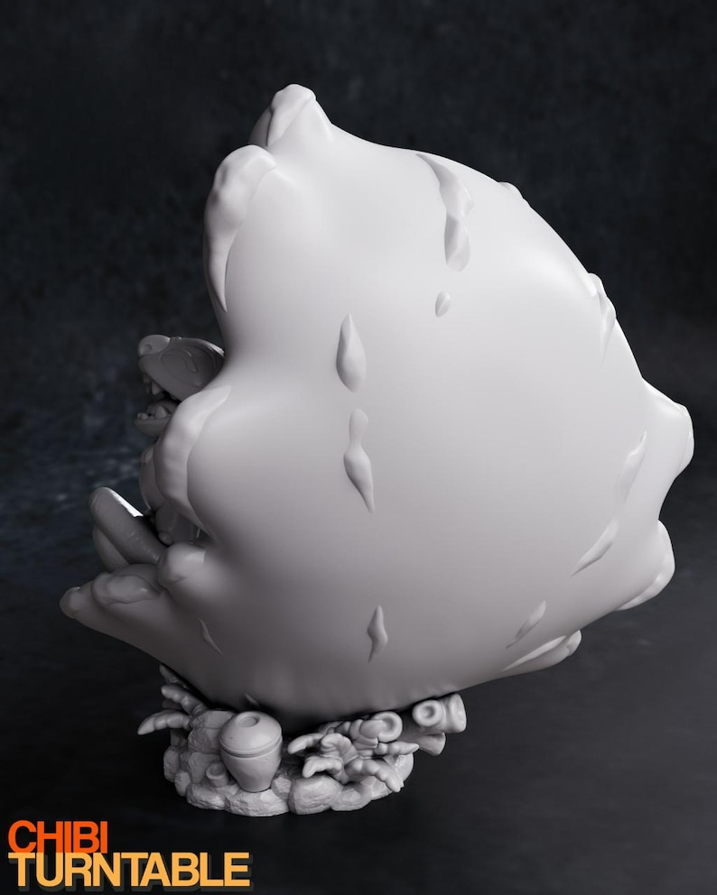 May include: A white, stylized sculpture with a textured surface and a base featuring small, detailed elements. The sculpture has a rounded shape with droplet-like details. The words "CHIBI TURNTABLE" are visible in orange.