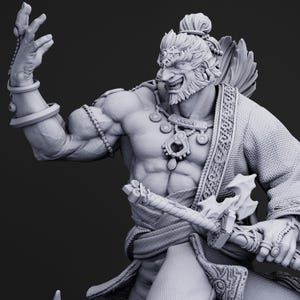 May include: A detailed grayscale sculpture of a muscular warrior with a fierce expression. The figure is adorned with intricate jewelry, a patterned robe, and a weapon. The warrior's pose is dynamic, with one arm raised and the other holding the weapon.