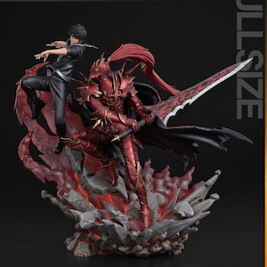 May include: A full-size action figure featuring two characters. One is in black attire, the other in red armor, holding a large sword. The base is a rocky, fiery design. The word "TURNTABLE" is at the top left.