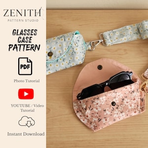 Może przedstawiać: Wzór PDF etui na okulary Zenith Pattern Studio z etui w jasnoniebieskie stokrotki i różowe kwiaty z czarnymi okularami w środku. Zawiera instrukcję fotograficzną, wideo na YouTube oraz opcję natychmiastowego pobrania.