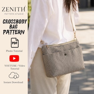May include: A grey textured crossbody bag with a front pocket and a snap closure, featuring a long adjustable strap. The image includes text: ZENITH PATTERN STUDIO, CROSSBODY BAG PATTERN, PDF, Photo Tutorial, YOUTUBE / Video Tutorial, Instant Download.