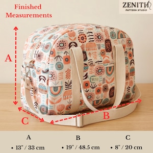 May include: A cream-colored duffel bag with a multi-colored floral and geometric pattern, featuring two beige fabric handles and an adjustable shoulder strap. The bag has finished measurements of 13 inches high, 19 inches wide, and 8 inches deep.